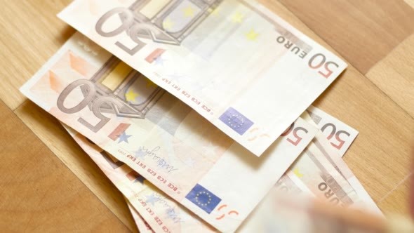 Close Shot of Hands Counting Euro Money Bills