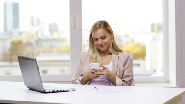 Smiling Businesswoman Or Student With Smartphone alt