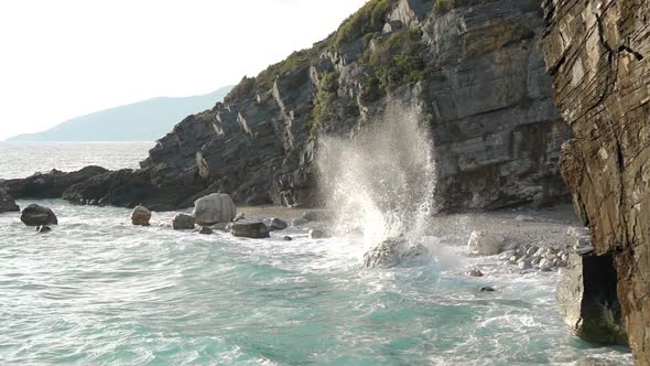 Surf on the Rocky Shore and Spray