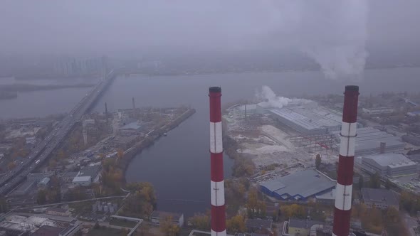 Smoke Comes From the Chimney. Aerial. Air Pollution. Ecology. Kyiv. Ukraine. alt