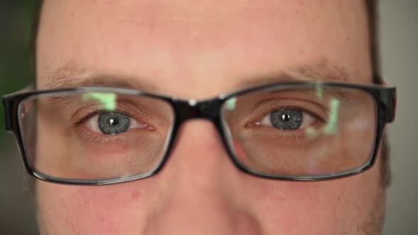 Eyes of a Man in Glasses Closeup alt