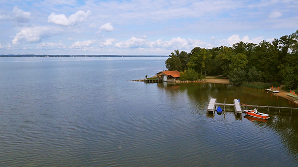 Aerial Footage of a Lake with Boat House