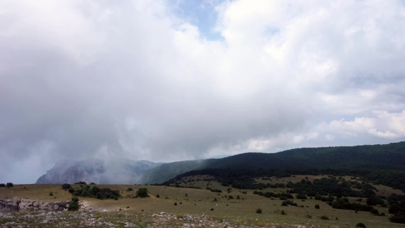 The Formation Of Clouds Between The Mountains And The Sea. Black Sea. Summer.