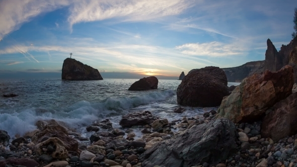 Cross On a Rock In The Sea, On The Coast In The Evening, Stock Footage