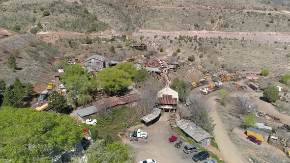 Aerial of cars and buildings at the Ghost Town alt