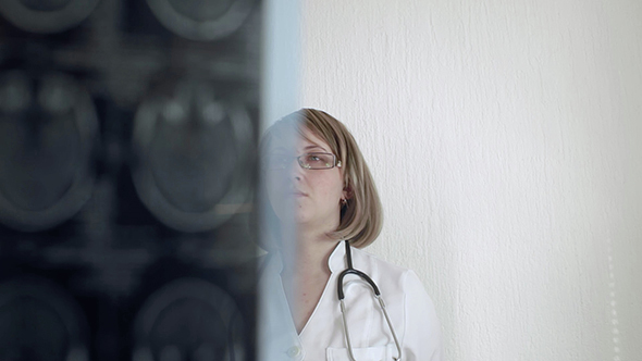 Doctor Examine An X-ray