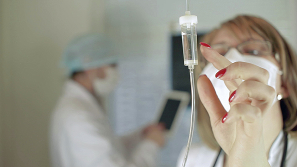 Two Doctors Discussing Diagnosis alt