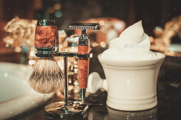 Shaving accessories a bathroom interior. Stock Photo by