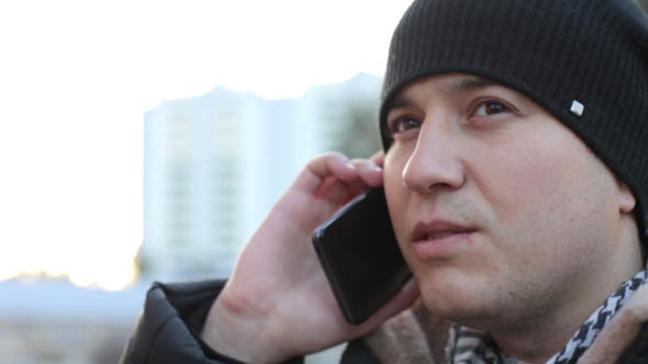 Man Talking on the Phone at Sunset 1 alt