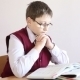 Boy With Glasses Reading a Book  - VideoHive Item for Sale