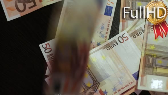 Counting Euros. Euro Banknotes Falling Down