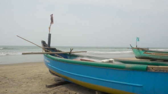 Old Blue Fisherman Boat On The Beach