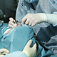Surgeon Hands During Operation In Surgery Room Surgeon Hands During Operation In Surgery Room - VideoHive Item for Sale