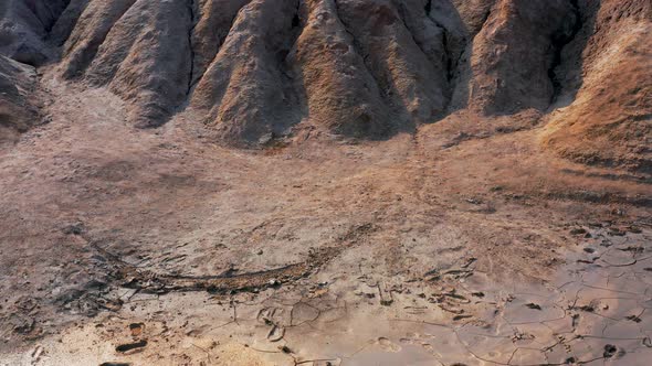Aerial View of a Landscape Similar To the Planet Mars with Red Hills and Rivers with Red Water alt