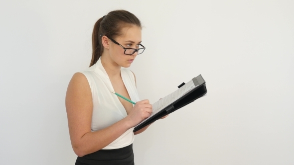 Businesswoman Makes Notes alt