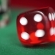 Red Dice Rotation And Casino Chips On Green Felt - VideoHive Item for Sale