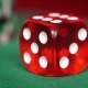 Red Dice Rotation And Casino Chips On Green Felt - VideoHive Item for Sale