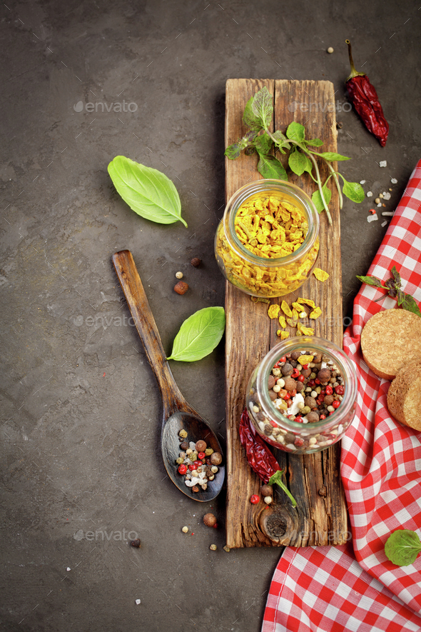 Different peppers in a jars of glass Stock Photo by Vell PhotoDune