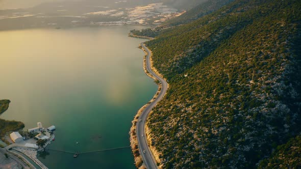 Spectacular View From Drone of Mountain Road Near the Turquoise Sea or Ocean alt