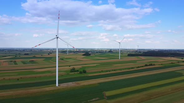 Arrays of Large Turbines From a Drone in Summer alt
