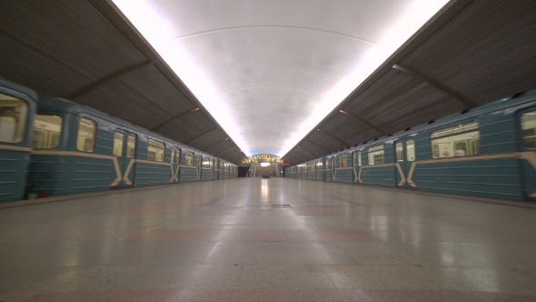Underground Station In Moscow With Two Passing Trains