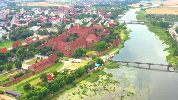 Castle fortifications of the Teutonic Order in Malbork from East. Malbork Castle is the largest cast alt
