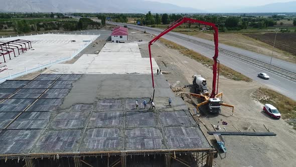 Foundry Workers Pours Of Concrete Blocks