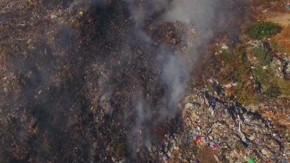 Huge Burning Waste Deposit Covered With Smoke