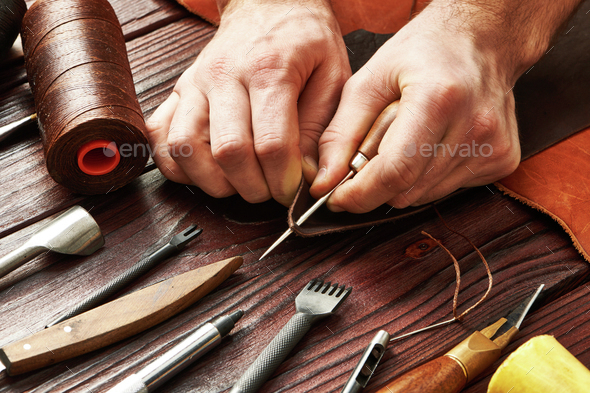 Leather crafting tools Stock Photo by haveseen