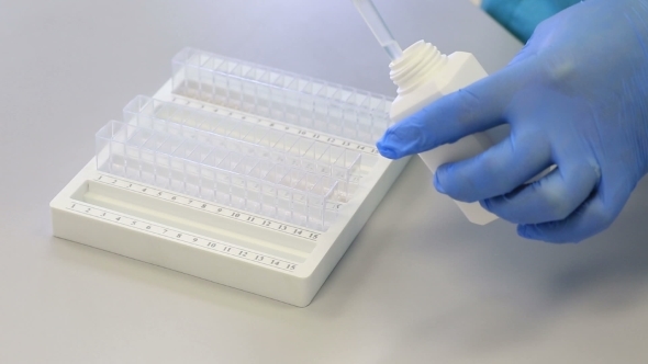 Distribution Of The Reagent Dispenser In Multikyuveta Tracks With Samples For Biochemical Analyzer. alt