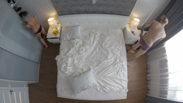 Man And Woman Dress Up In The Morning alt