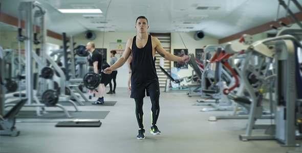 Athlete Exercising Using Jump Rope alt