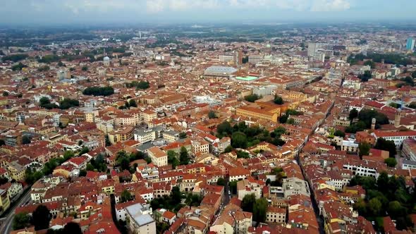 City of Padua Italy with tiled red roofs and Basilica of St. Anthony, Aerial dolly out reveal shot alt