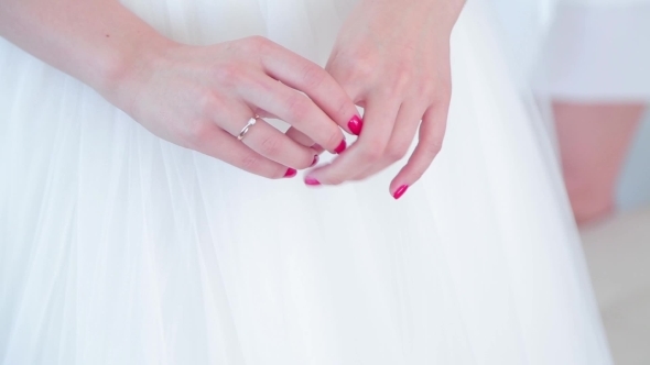 Bride With Red Manicure Nervous Hands