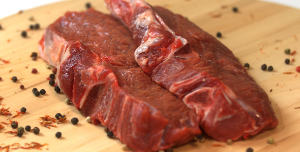 Fresh Raw Meat On Wooden Cutting Board