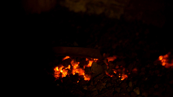 Loading Coals Into Furnace