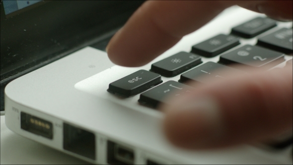 Pushing Escape Button On Laptop