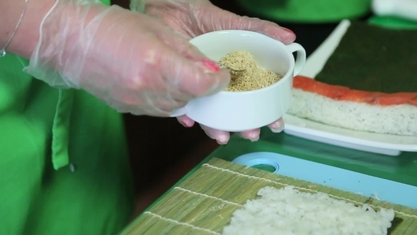 Sushi Master Sprinkles Sesame Posted On Nori Rice