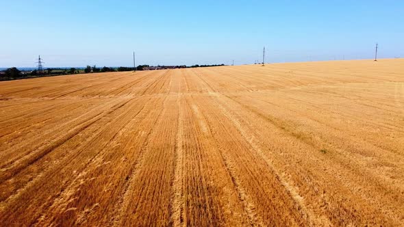 Aerial drone view of a flying over the rural agricultural landscape. alt