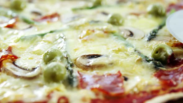 Delicious italian pizza served on wooden table alt