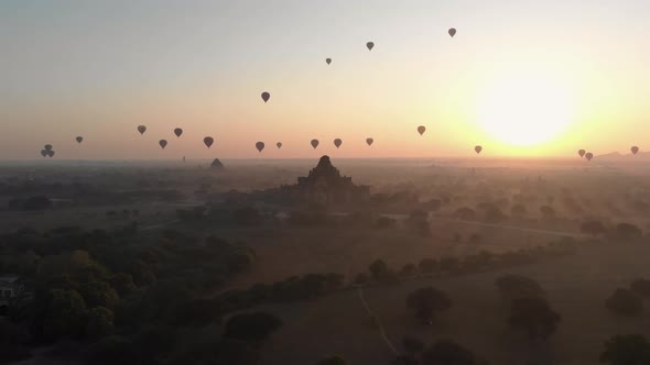 Aerial view of hot balloons in the Old Bagan temple site. alt