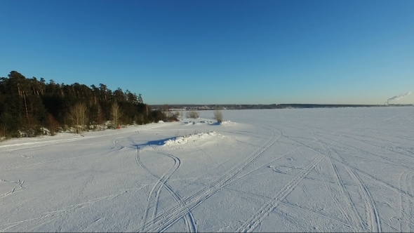 Flying Over The Frozen Sea. Forest On The Banks. Flying Along The Shore
