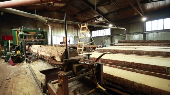 Woodshop. View Of Working Machine And Treated Wood