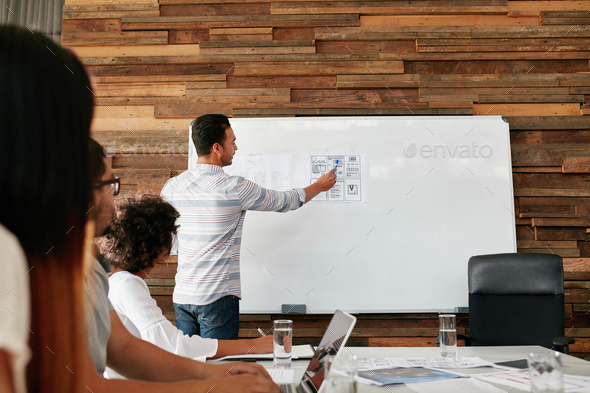 Brainstorming at a meeting room of creative agency - Stock Photo - Images