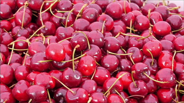 Lots of Red Cherries on the Basket alt