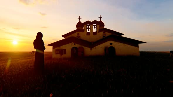 Nun standing in front of Old Church and Sunset View