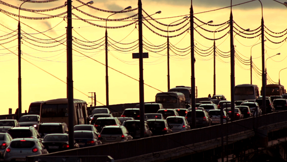 Car Traffic Jam at Sunset alt