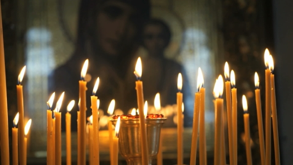 Church Candles Burn Before The Icon Mother Of God, Stock Footage ...