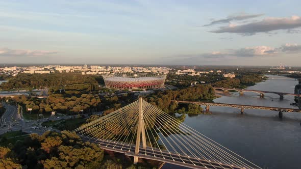 Drone view of Swietokrzyski Bridge and National Stadium in Warsaw, Poland alt