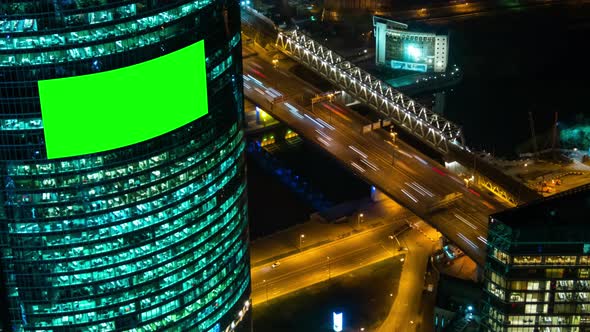 Timelapse, Blank Green Screen Billboard on Building and Cars Traffic at Night